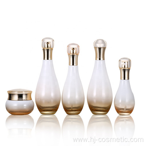 Wholesales high-grade Bowling shape Gradient golden cosmetics electroplating glass bottle/jars with good price